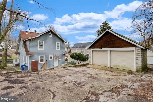 2306 Monticello Rd, Baltimore, MD 21216 - view of side of property featuring a garage