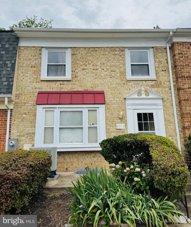 9713 Whiskey Run, Laurel, MD 20723 - townhome / multi-family property featuring brick siding