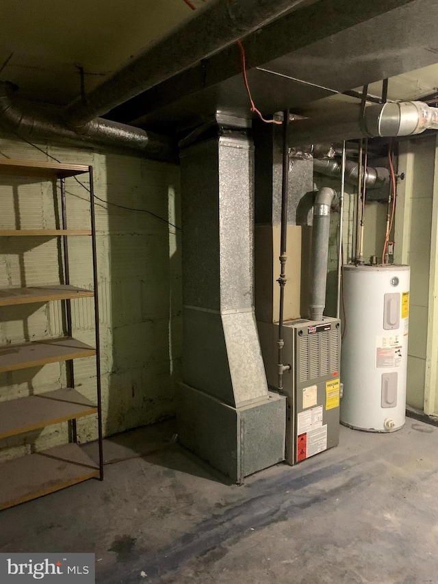 4103 Grace Ct, Baltimore City, MD 21226 - unfinished below grade area featuring electric water heater and heating unit