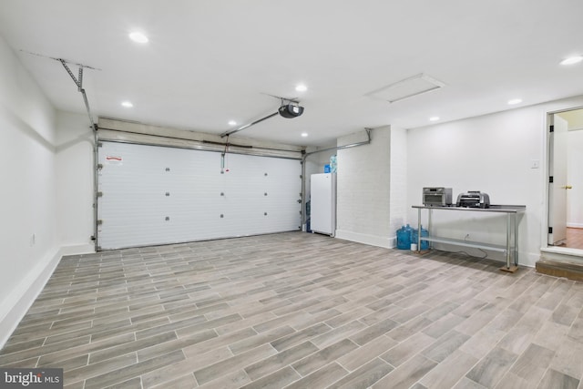 10104 Colebrook Ave, Potomac, MD 20854 - garage featuring recessed lighting, baseboards, and a garage door opener