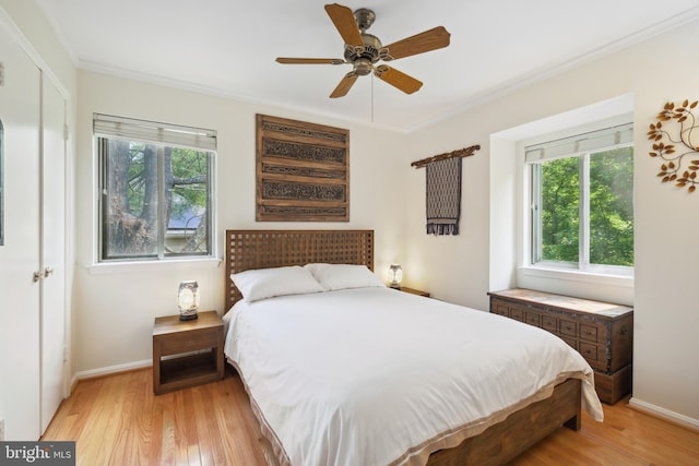 10104 Colebrook Ave, Potomac, MD 20854 - bedroom with light wood finished floors, ornamental molding, baseboards, and a ceiling fan