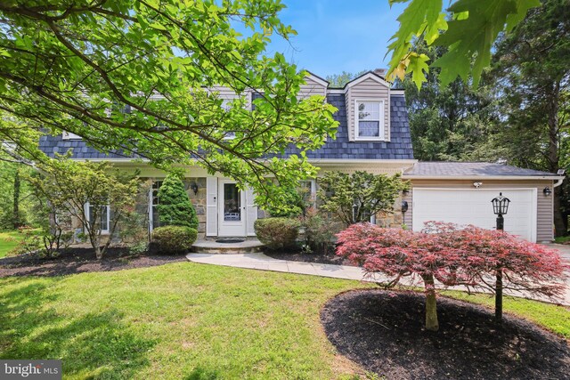 10104 Colebrook Ave, Potomac, MD 20854 - view of front of house with a front lawn and an attached garage
