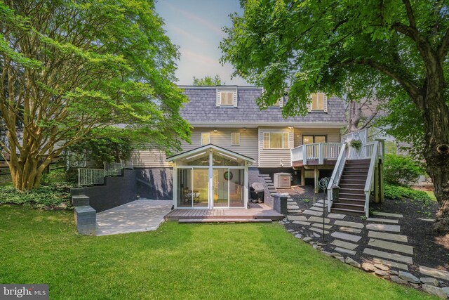 10104 Colebrook Ave, Potomac, MD 20854 - back of property featuring stairs, a deck, a lawn, and a patio