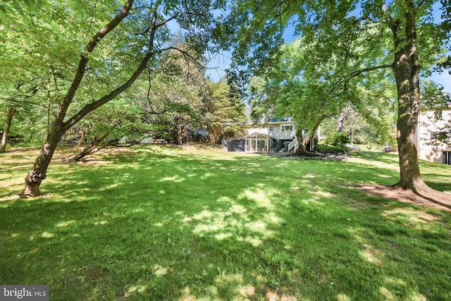 10104 Colebrook Ave, Potomac, MD 20854 - view of grassy yard featuring a sunroom