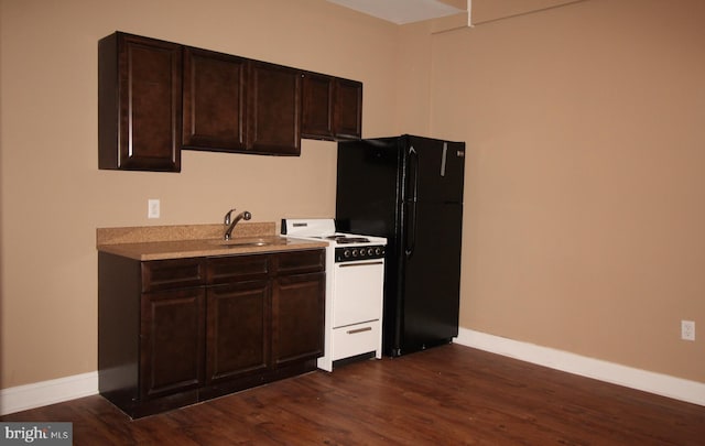 4623 N Broad St, Philadelphia, PA 19140 - kitchen featuring white electric range, a sink, baseboards, and dark wood-type flooring