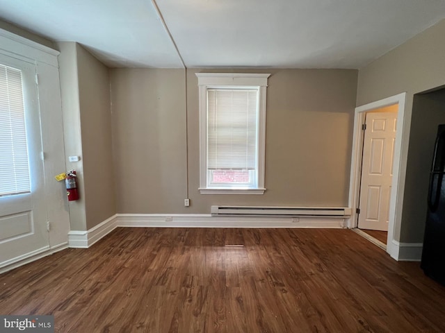 4623 N Broad St, Philadelphia, PA 19140 - foyer entrance featuring wood finished floors, a baseboard heating unit, and baseboards