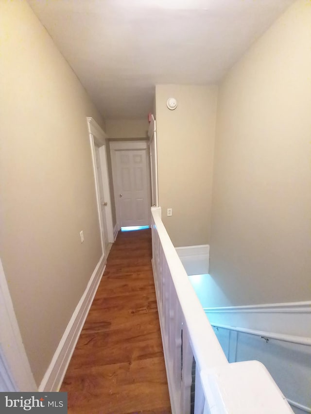 4623 N Broad St, Philadelphia, PA 19140 - hallway featuring an upstairs landing, wood finished floors, and baseboards