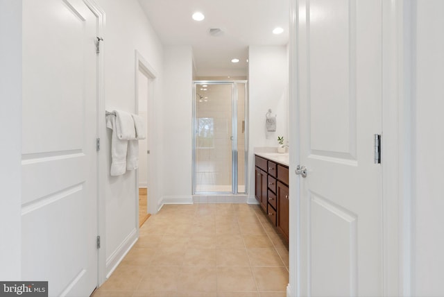 118 Milkweed Dr, Lake Frederick, VA 22630 - full bathroom featuring a stall shower, vanity, recessed lighting, tile patterned flooring, and baseboards
