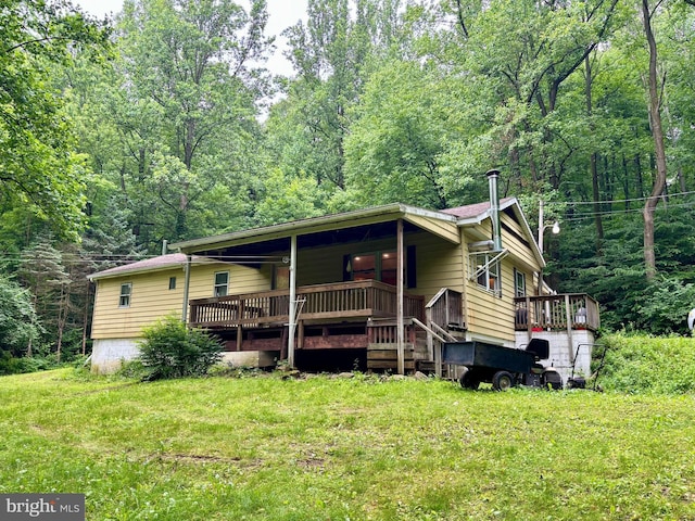 149 Smoketown Rd, Mertztown, PA 19539 - view of front of house featuring a wooded view and covered porch