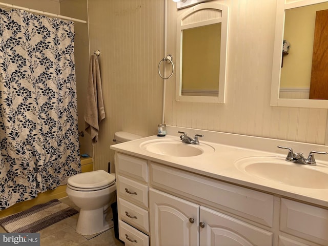 149 Smoketown Rd, Mertztown, PA 19539 - bathroom featuring double vanity, tile patterned flooring, and toilet