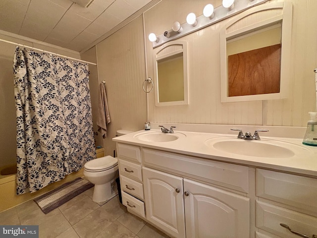 149 Smoketown Rd, Mertztown, PA 19539 - bathroom with double vanity, tile patterned flooring, toilet, and shower / tub combo with curtain