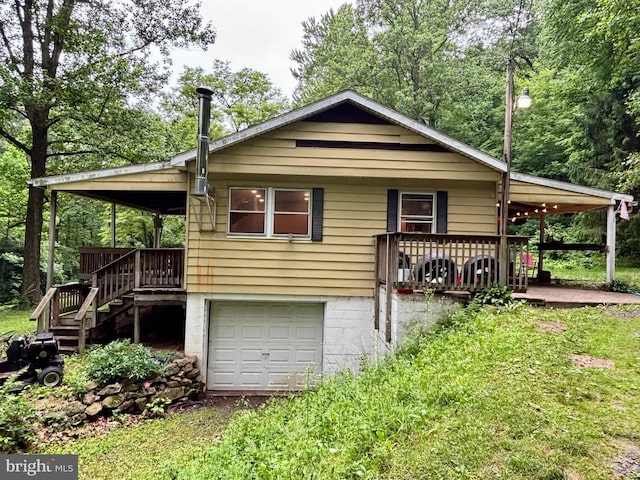 149 Smoketown Rd, Mertztown, PA 19539 - view of front of property featuring an attached garage, driveway, stairs, and a porch