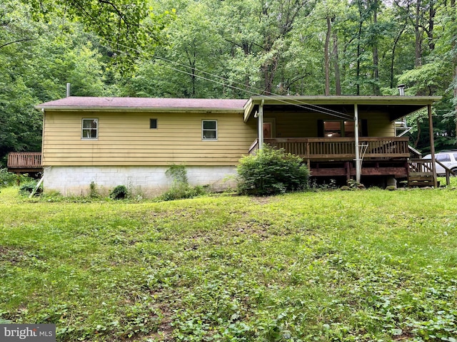 149 Smoketown Rd, Mertztown, PA 19539 - view of property exterior with a deck and a wooded view
