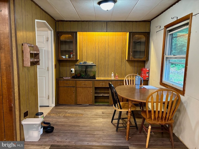 149 Smoketown Rd, Mertztown, PA 19539 - dining room featuring wooden walls, light wood-type flooring, and crown molding