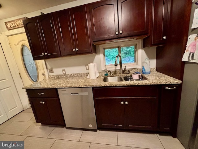 149 Smoketown Rd, Mertztown, PA 19539 - kitchen with stainless steel dishwasher, a sink, light stone countertops, and light tile patterned floors