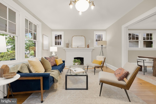 1505 Otis St NE, Washington, DC 20017 - living room featuring wood finished floors, plenty of natural light, and a fireplace