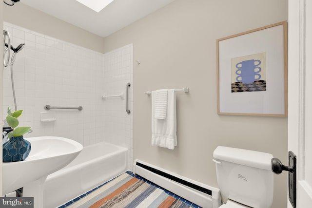 1505 Otis St NE, Washington, DC 20017 - bathroom featuring a baseboard radiator, toilet, and washtub / shower combination