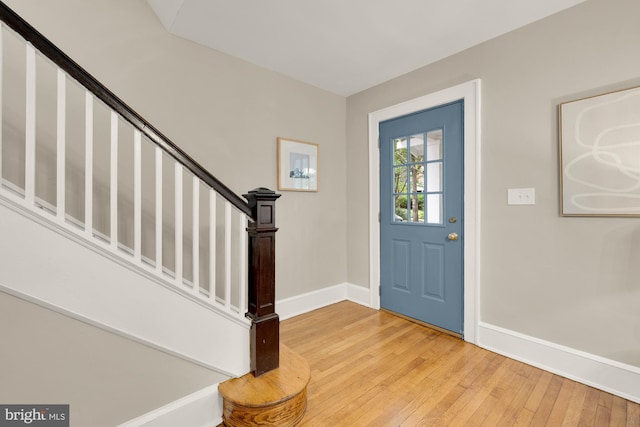 1505 Otis St NE, Washington, DC 20017 - foyer entrance featuring baseboards, light wood-style floors, and stairs