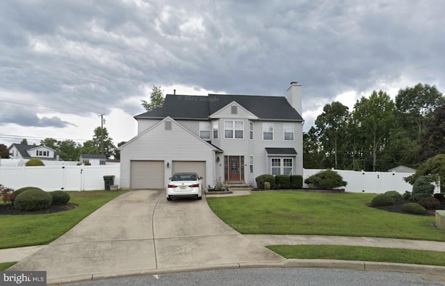 3 Hollybrook Ct, Sewell, NJ 08080 - traditional-style home with a gate, concrete driveway, a chimney, and an attached garage