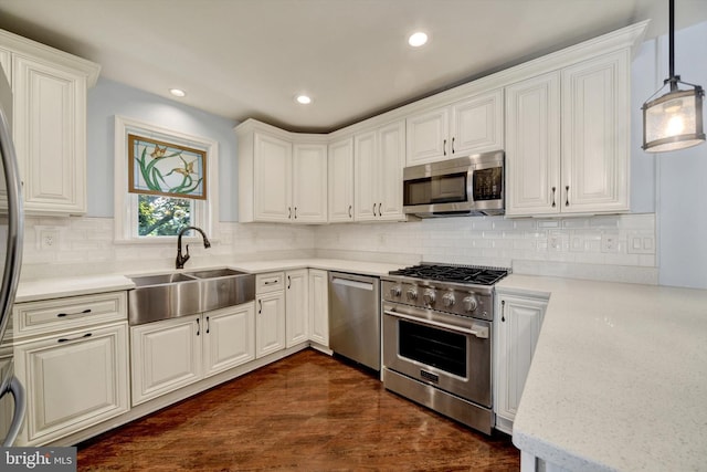 4220 E Joppa Rd, Nottingham, MD 21236 - kitchen featuring stainless steel appliances, a sink, tasteful backsplash, recessed lighting, and dark wood finished floors