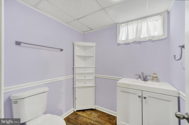 4220 E Joppa Rd, Nottingham, MD 21236 - bathroom with a drop ceiling, vanity, toilet, wood finished floors, and baseboards