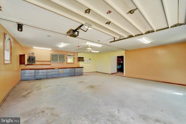 4220 E Joppa Rd, Nottingham, MD 21236 - garage featuring electric panel, a garage door opener, and baseboards