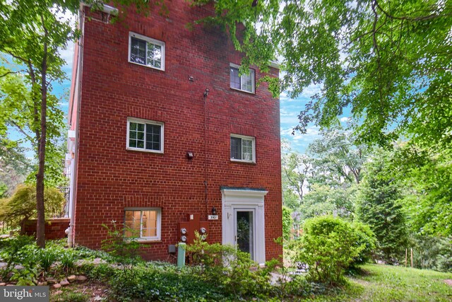 3501 Martha Custis Dr, Alexandria, VA 22302 - rear view of property with brick siding