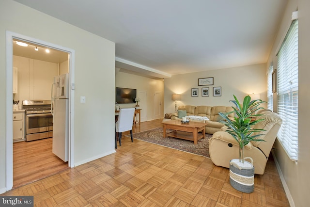 3501 Martha Custis Dr, Alexandria, VA 22302 - living area featuring plenty of natural light and baseboards