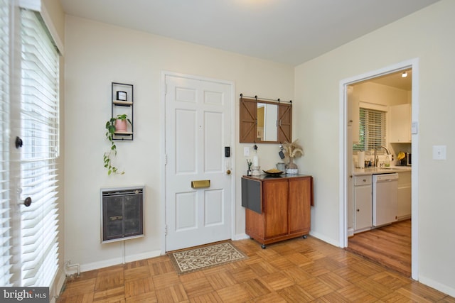 3501 Martha Custis Dr, Alexandria, VA 22302 - foyer entrance with heating unit, healthy amount of natural light, and baseboards