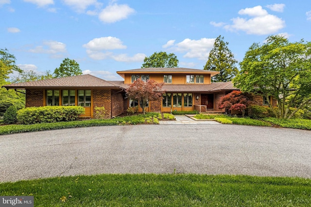 76 Seminary Farm Rd, Lutherville Timonium, MD 21093 - view of front of house with brick siding and a porch