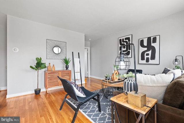 4937 Schaub Ave, Baltimore, MD 21206 - living area with light wood-style floors and baseboards