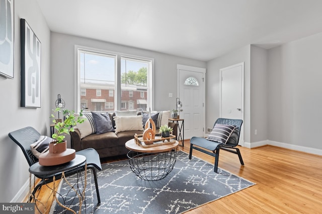 4937 Schaub Ave, Baltimore, MD 21206 - living area featuring baseboards and wood finished floors