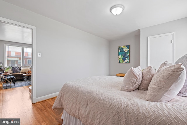 4937 Schaub Ave, Baltimore, MD 21206 - bedroom with light wood finished floors and baseboards