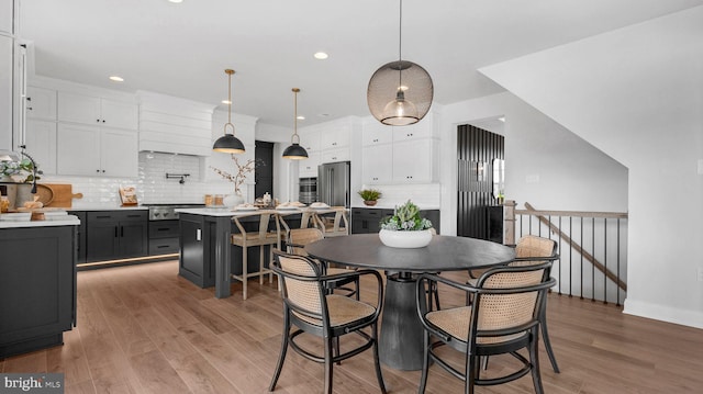 4389 Taviston Ct E, Emmaus, PA 18049 - dining room with light wood finished floors, recessed lighting, and baseboards