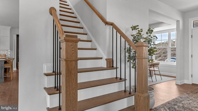 4389 Taviston Ct E, Emmaus, PA 18049 - stairway with wood finished floors and baseboards