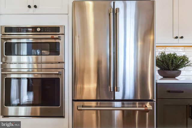 4389 Taviston Ct E, Emmaus, PA 18049 - kitchen featuring appliances with stainless steel finishes and white cabinetry