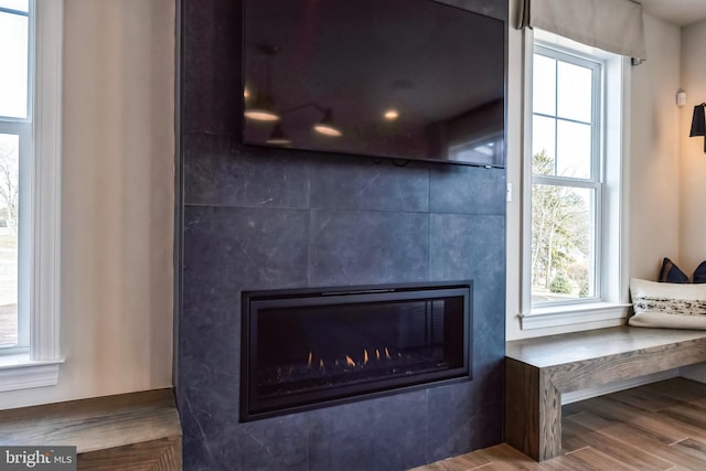 4389 Taviston Ct E, Emmaus, PA 18049 - detailed view of a large fireplace and wood finished floors