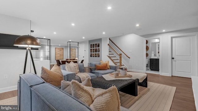 4389 Taviston Ct E, Emmaus, PA 18049 - living room featuring stairway, recessed lighting, baseboards, and wood finished floors