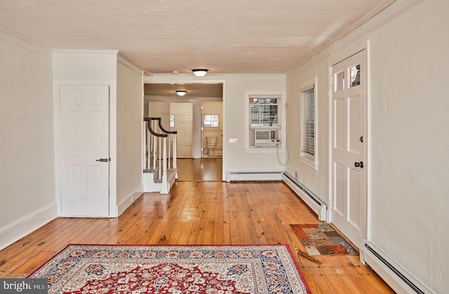 38 W Ferry St, New Hope, PA 18938 - foyer entrance with a baseboard heating unit, light wood-style flooring, and crown molding