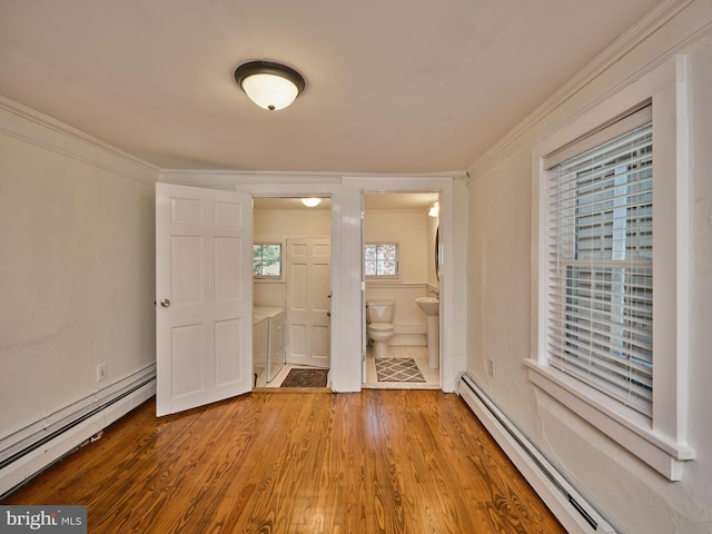 38 W Ferry St, New Hope, PA 18938 - entryway featuring baseboard heating, crown molding, and wood finished floors