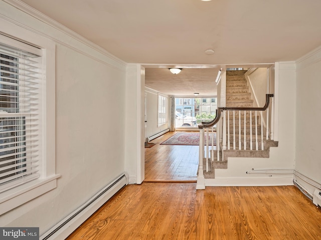 38 W Ferry St, New Hope, PA 18938 - entrance foyer with a baseboard radiator, stairs, and wood finished floors