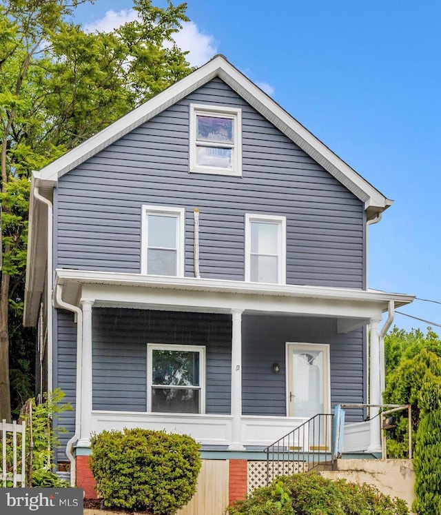 21 E D St, Brunswick, MD 21716 - american foursquare style home with a porch