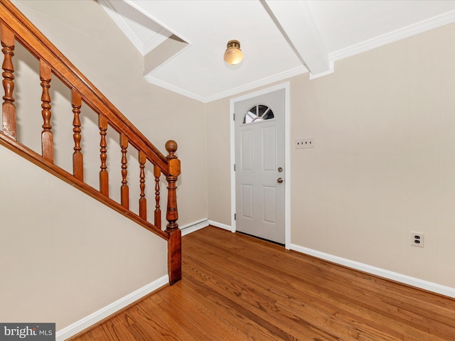 21 E D St, Brunswick, MD 21716 - entryway with wood finished floors, baseboards, stairway, and ornamental molding