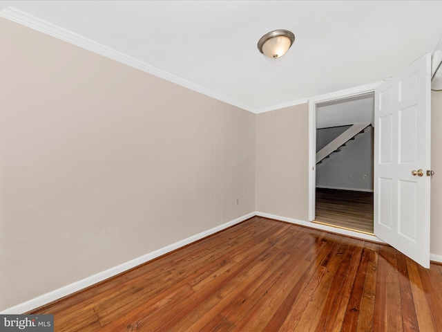 21 E D St, Brunswick, MD 21716 - spare room with baseboards, hardwood / wood-style floors, and crown molding