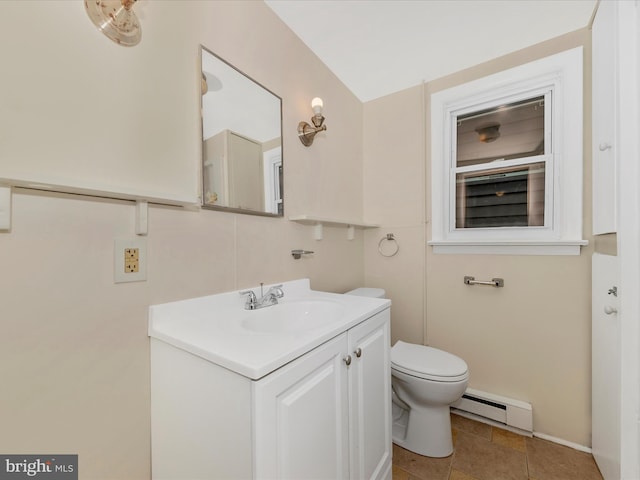 21 E D St, Brunswick, MD 21716 - half bath featuring baseboard heating, vanity, toilet, and baseboards