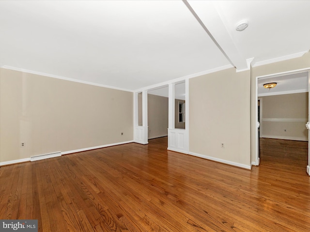 21 E D St, Brunswick, MD 21716 - unfurnished living room with a baseboard radiator, wood finished floors, crown molding, and baseboards