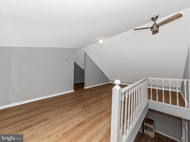 21 E D St, Brunswick, MD 21716 - staircase with ceiling fan, vaulted ceiling, baseboards, and wood finished floors