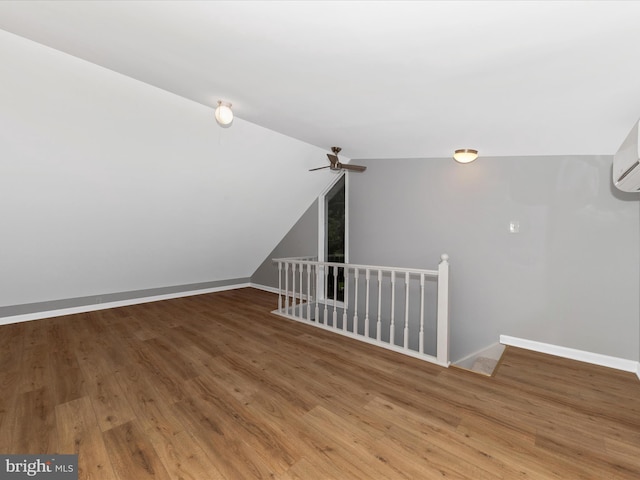 21 E D St, Brunswick, MD 21716 - bonus room with vaulted ceiling, wood finished floors, baseboards, and ceiling fan