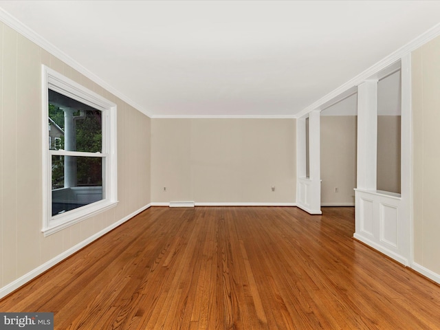 21 E D St, Brunswick, MD 21716 - unfurnished room featuring wood finished floors, ornamental molding, and baseboards