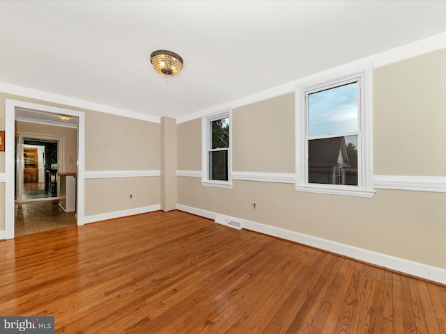 21 E D St, Brunswick, MD 21716 - spare room with light wood-style flooring and baseboards